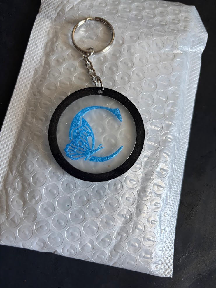 Letter With Butterfly Key Chain Round